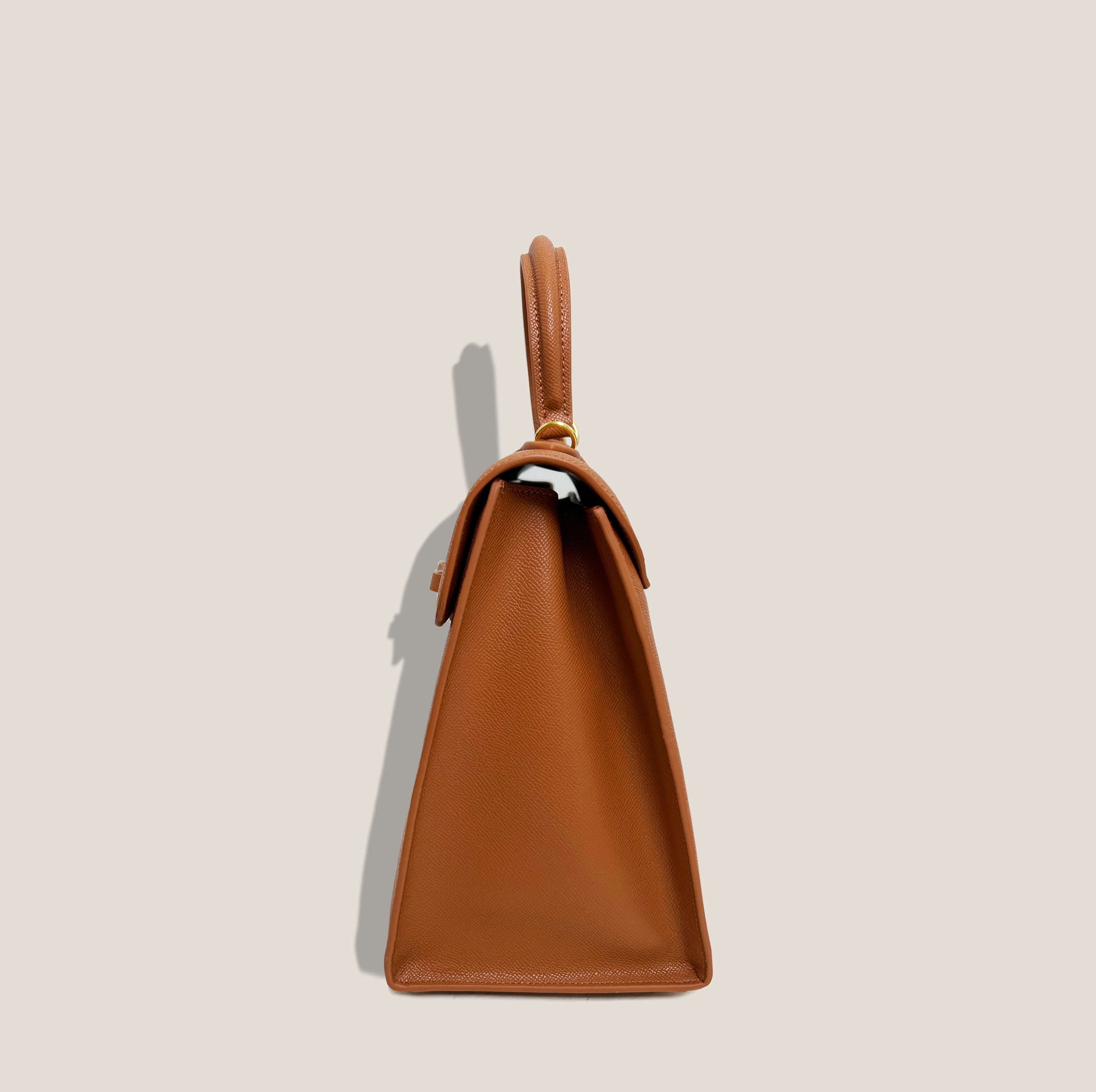 THE CARLTON BOW BAG in COGNAC*