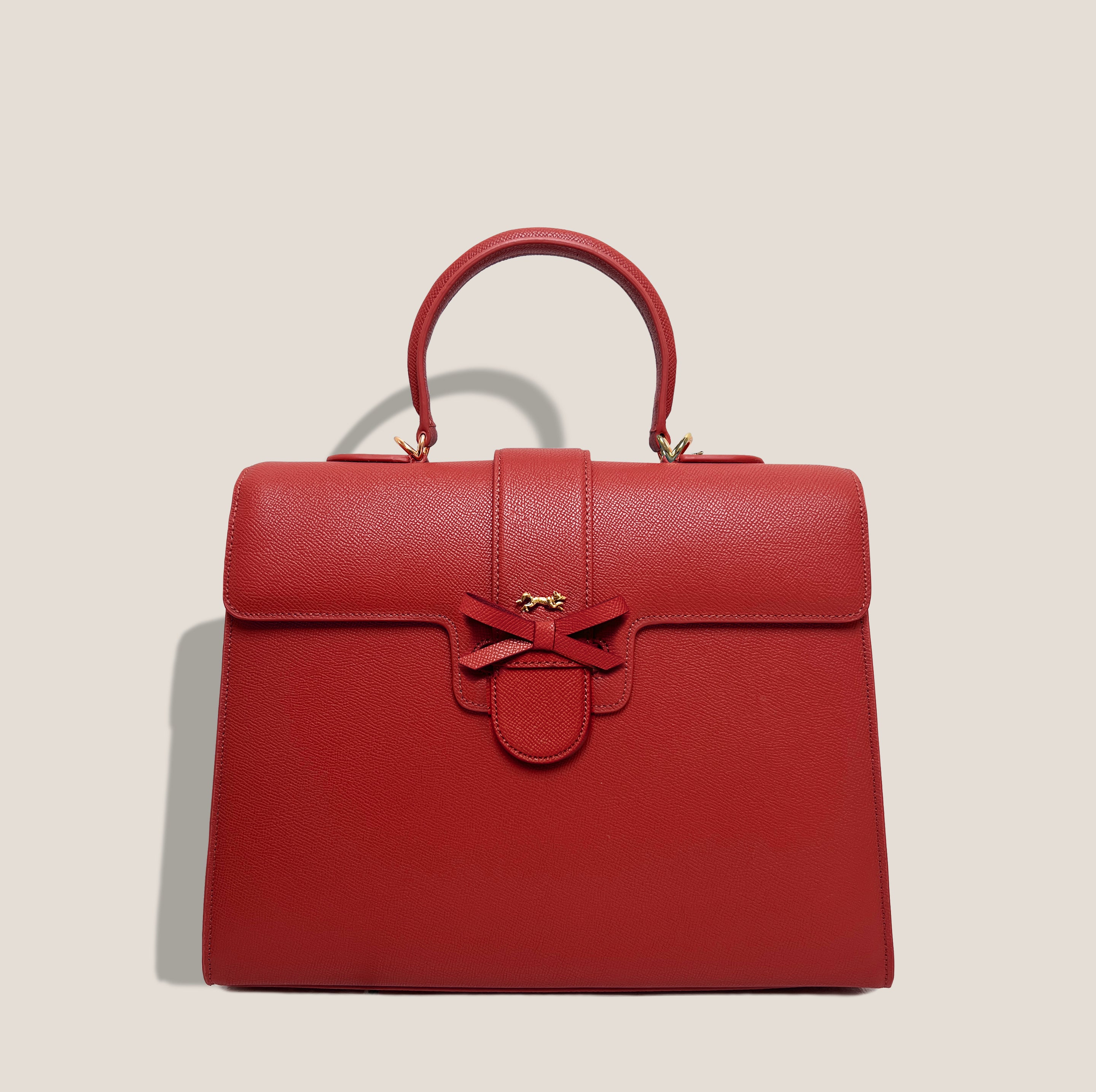 THE CARLTON BOW BAG in Poppy