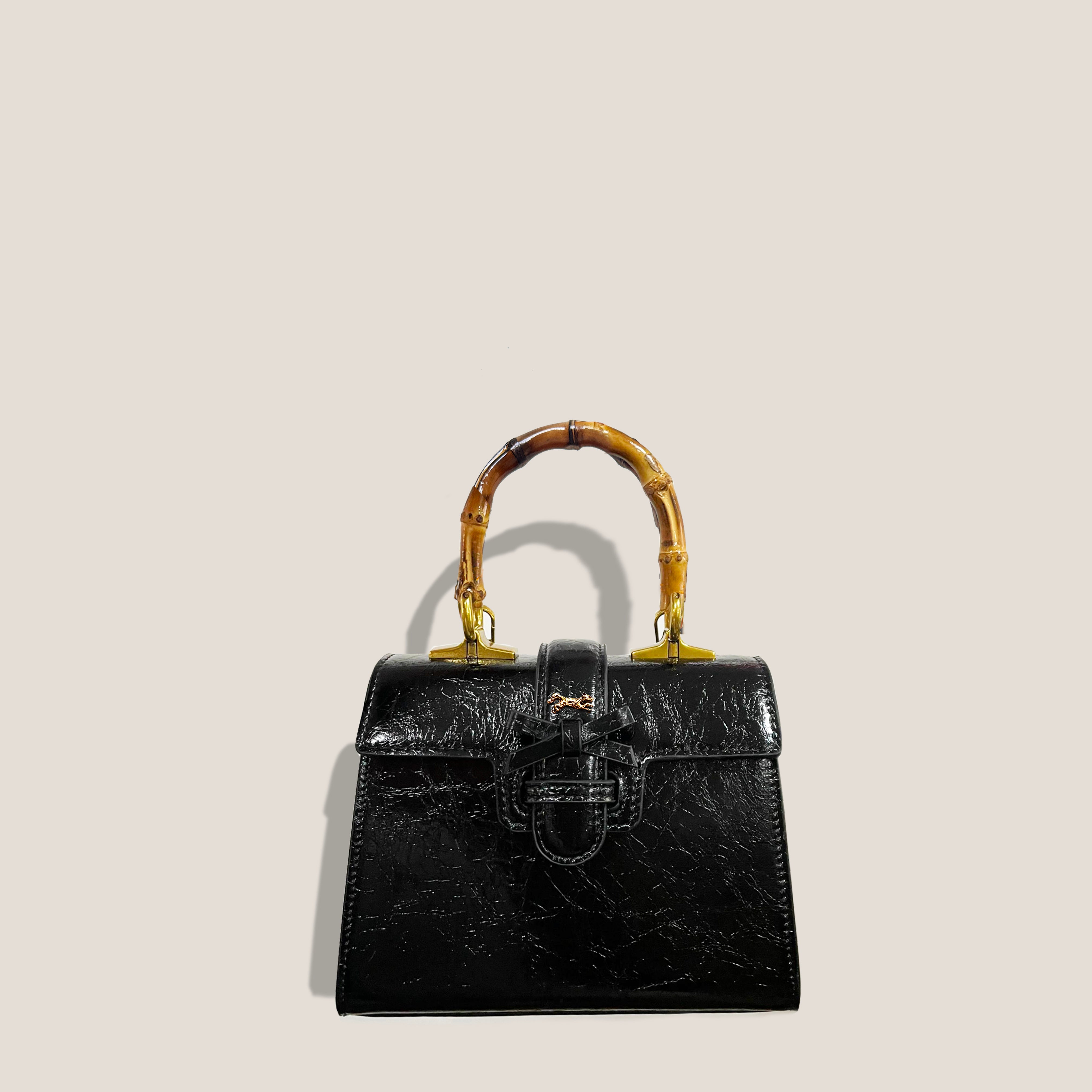 THE CARLTON BOW BAG 20cm - NOIR "Crushed Patent"