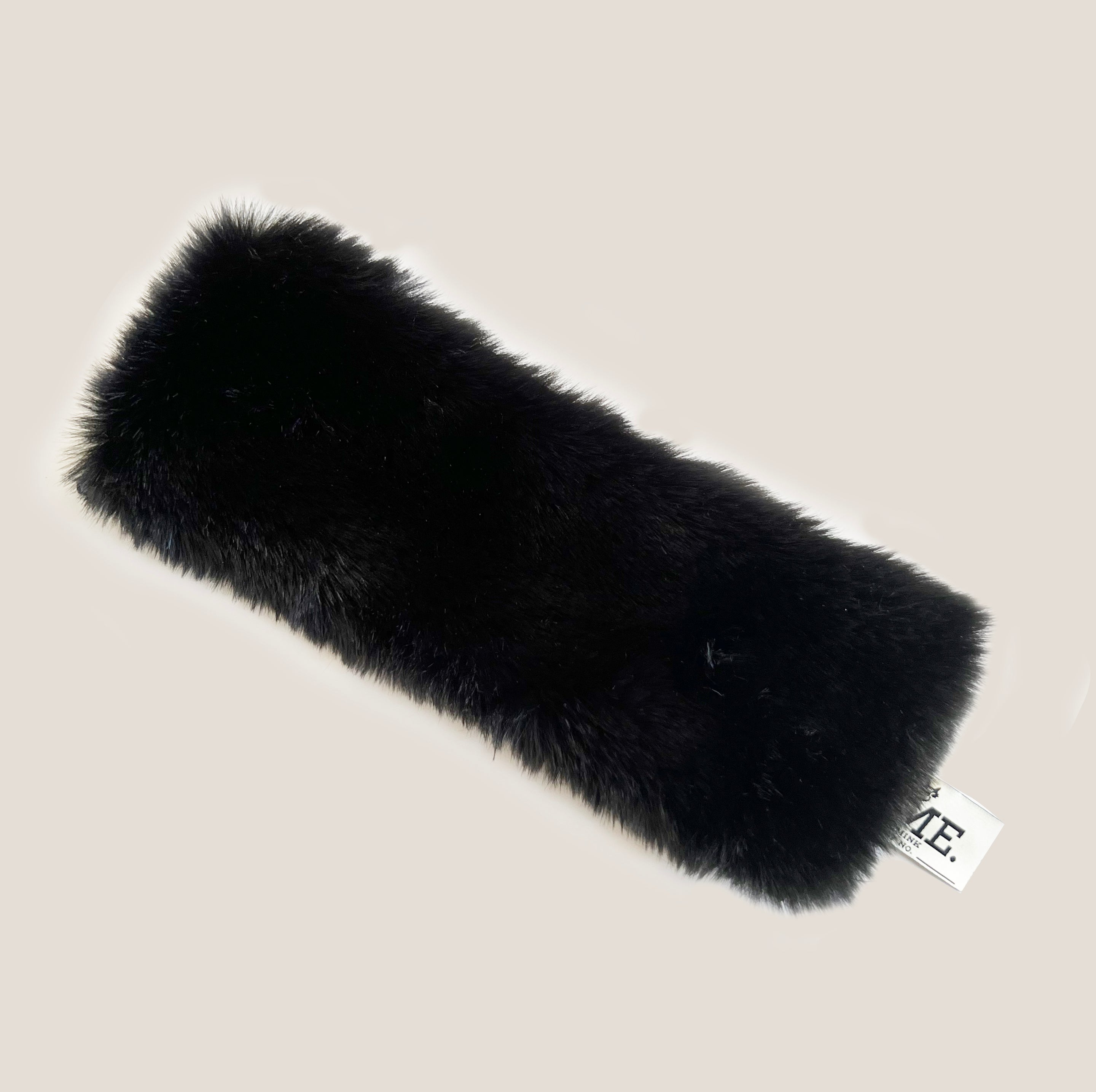 MME. FAUX FUR POOFFE