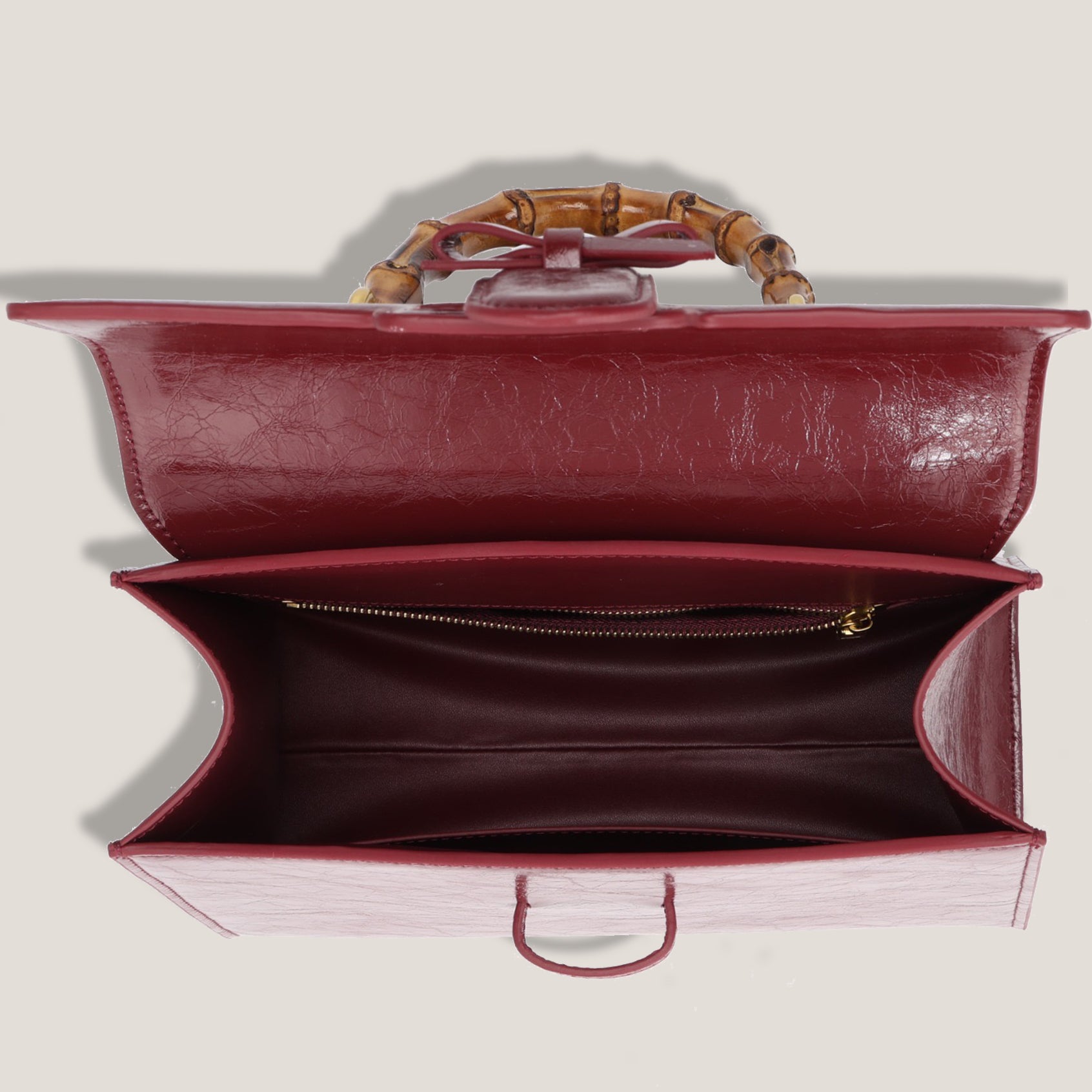 THE CARLTON BOW BAG PETITE - BURGUNDY "Crushed Patent"