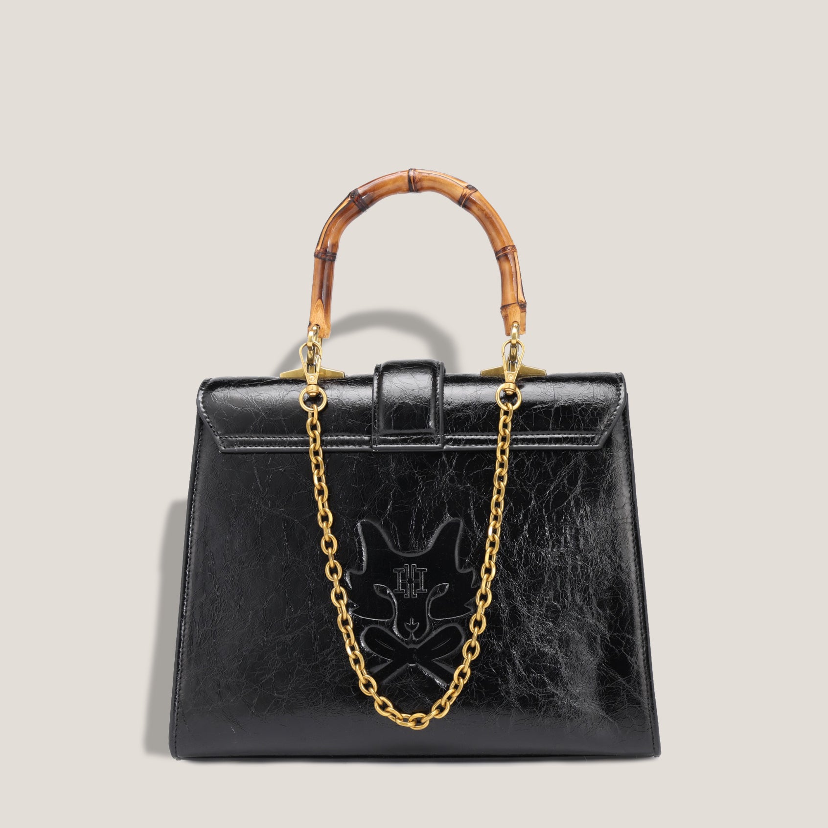 THE CARLTON BOW BAG PETITE - NOIR "CRUSHED PATENT"