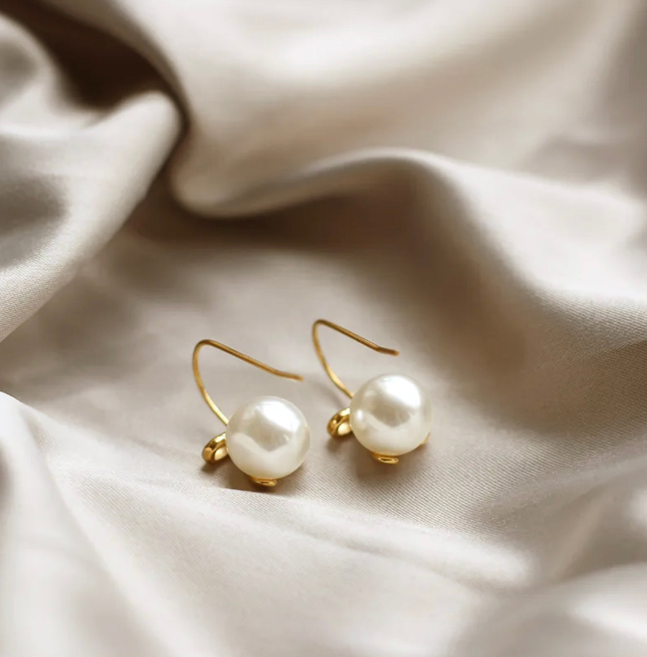 MME. CARLTON BOW PEARL EARRINGS