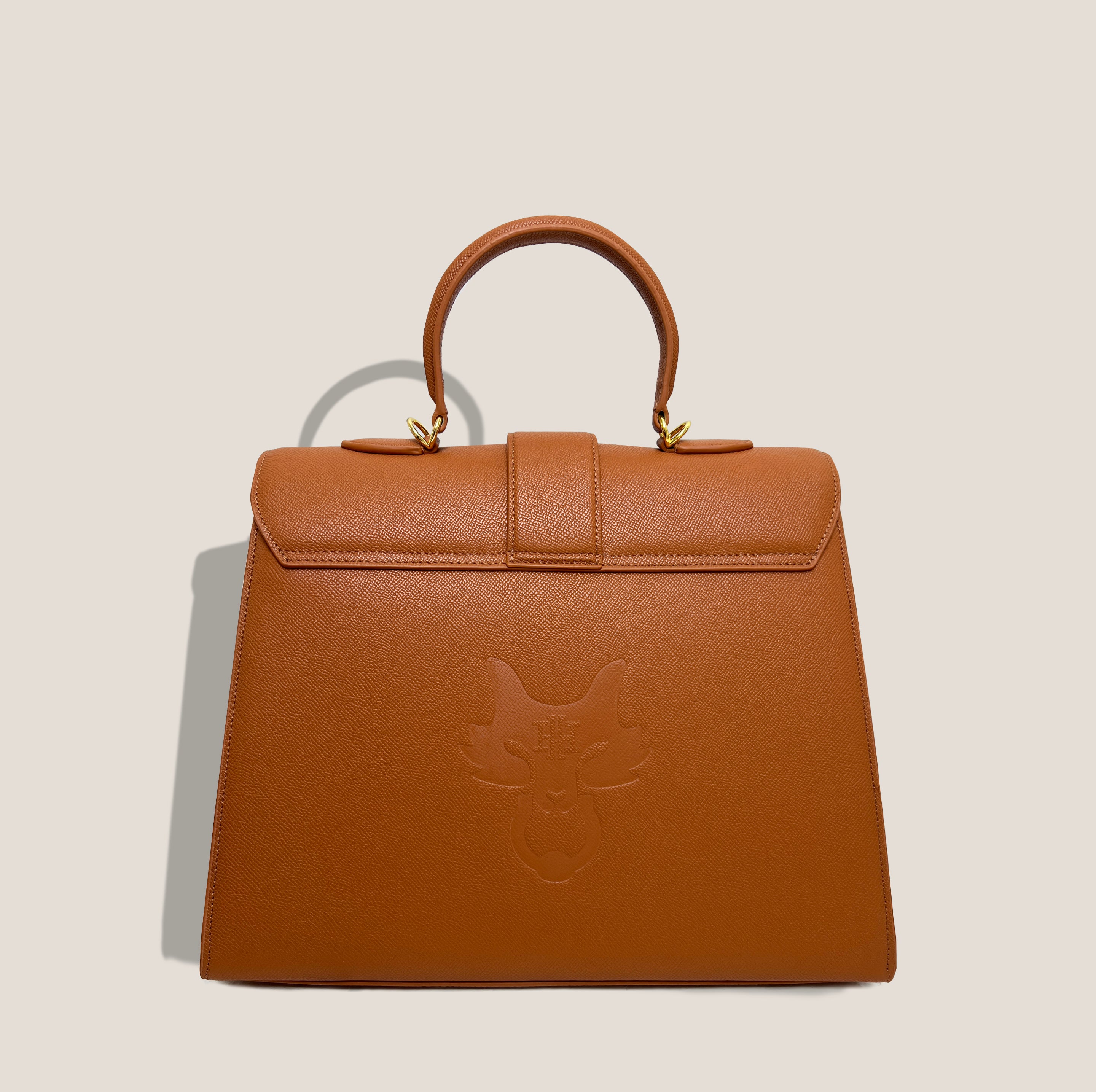 THE CARLTON BOW BAG in COGNAC*
