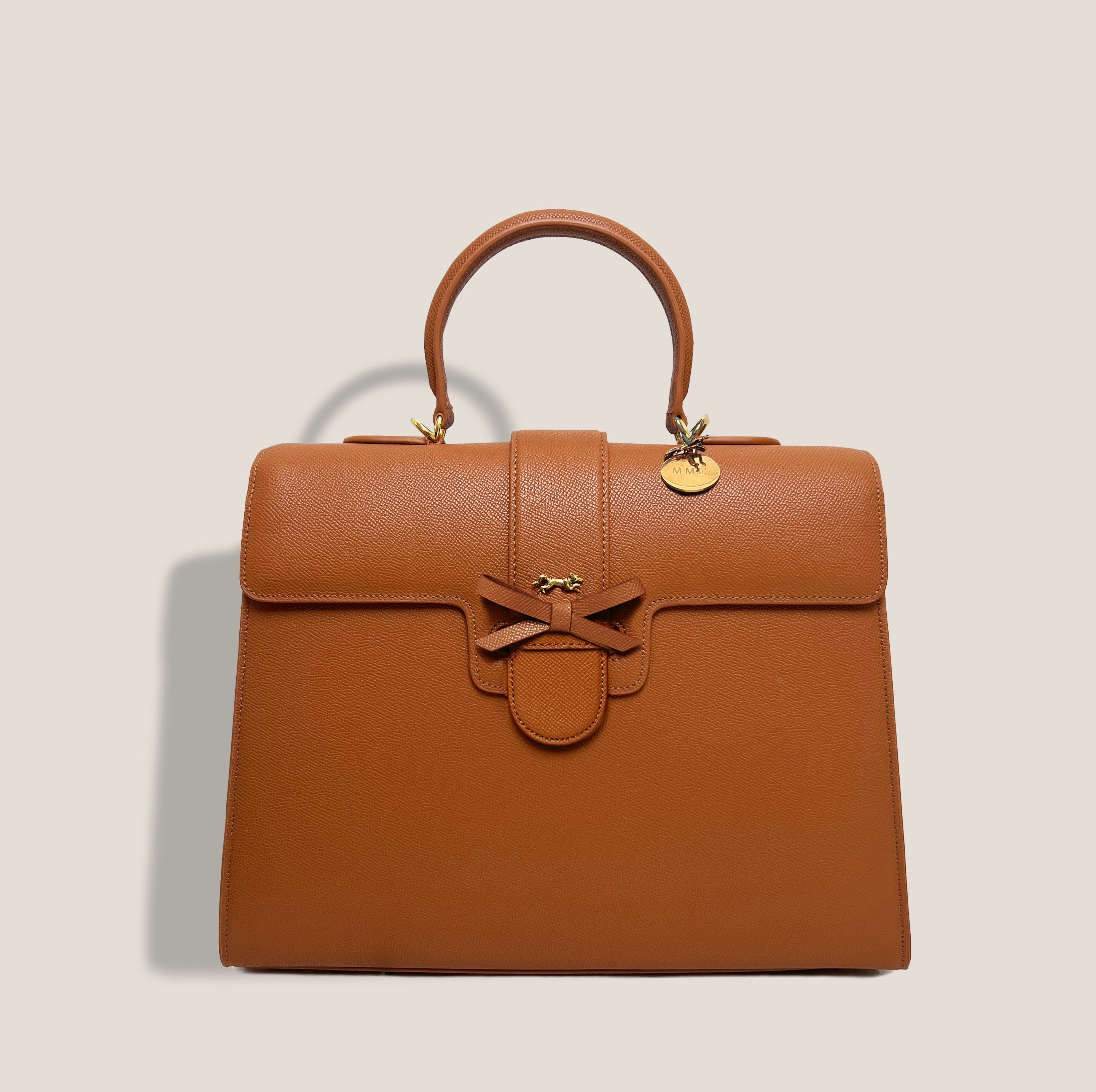 THE CARLTON BOW BAG in COGNAC*