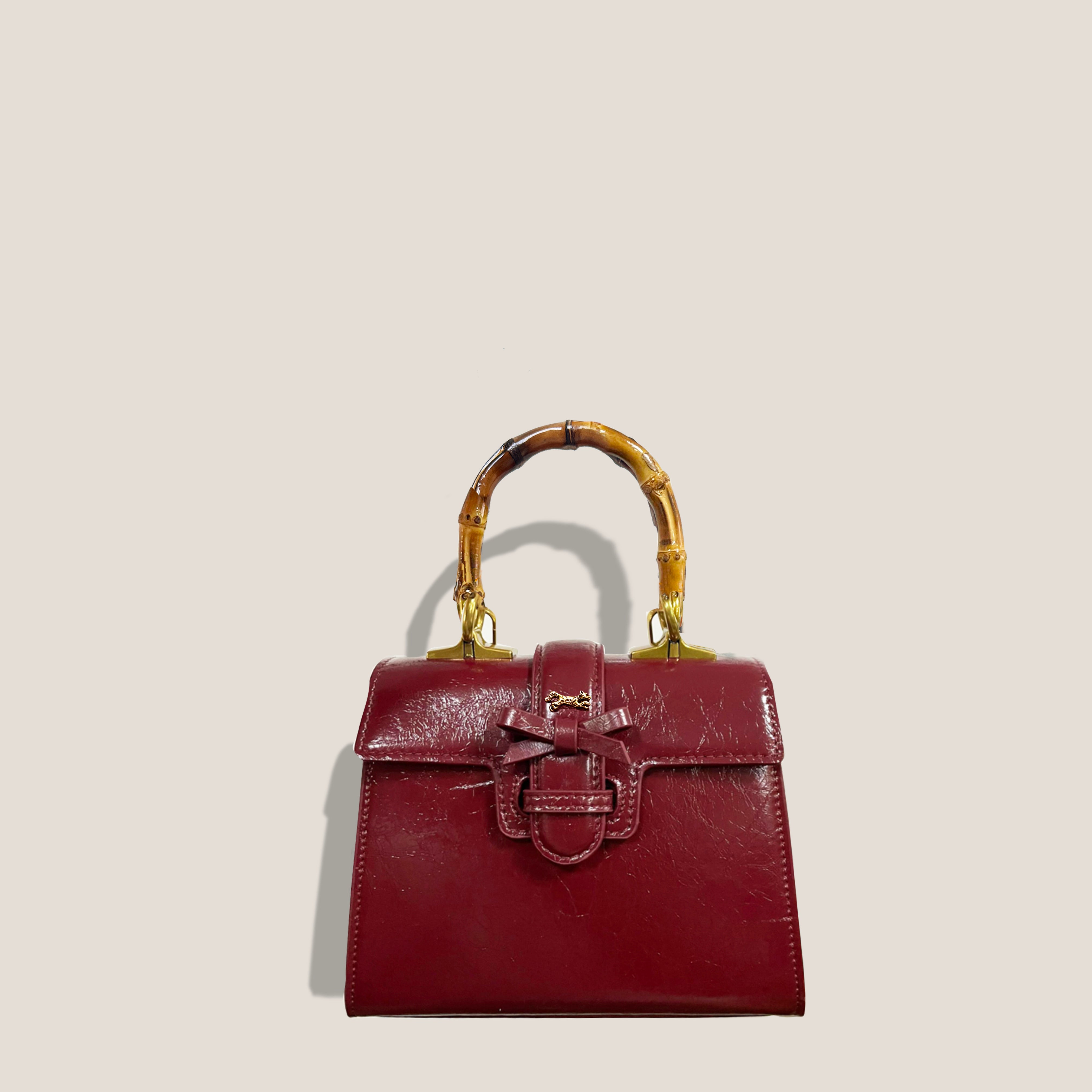 THE CARLTON BOW BAG 20cm - BURGUNDY "Crushed Patent"